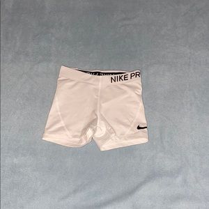 white nike pros xs